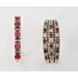 Two ruby and diamond dress rings, one set with five oval cut rubies and eight Swiss cut diamonds,