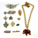 A group of vintage and antique costume jewellery including an Art Deco period paste and silver