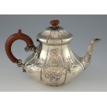 Victorian silver teapot with embossed decoration, on round foot, by Joseph & Albert Savory,