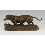 After P. J. Mene, bronze Dachshund on integral base, bearing signature, 14cm high, 31.5cm long,.