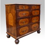 19th century continental walnut chest of two short over three long graduated drawers on bun feet,