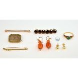 Collection of Jewellery, including a four brooches, one shaped mourning brooch with hair work,