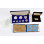 A collection of coins, including Franklin Mint 1979 Republic of the Philippines proof set boxed with