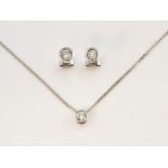 Diamond rub over set pendant, round brilliant cut diamond, total estimated diamond weight 0.30ct,