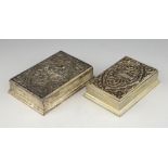 Two Far Eastern Sterling silver cigarette boxes with embossed figural decoration, 16.5cm wide and