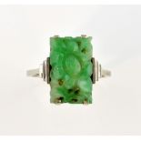 Art Deco Jadeite ring, rectangular carved floral design, mounted in white metal testing as 9 ct,