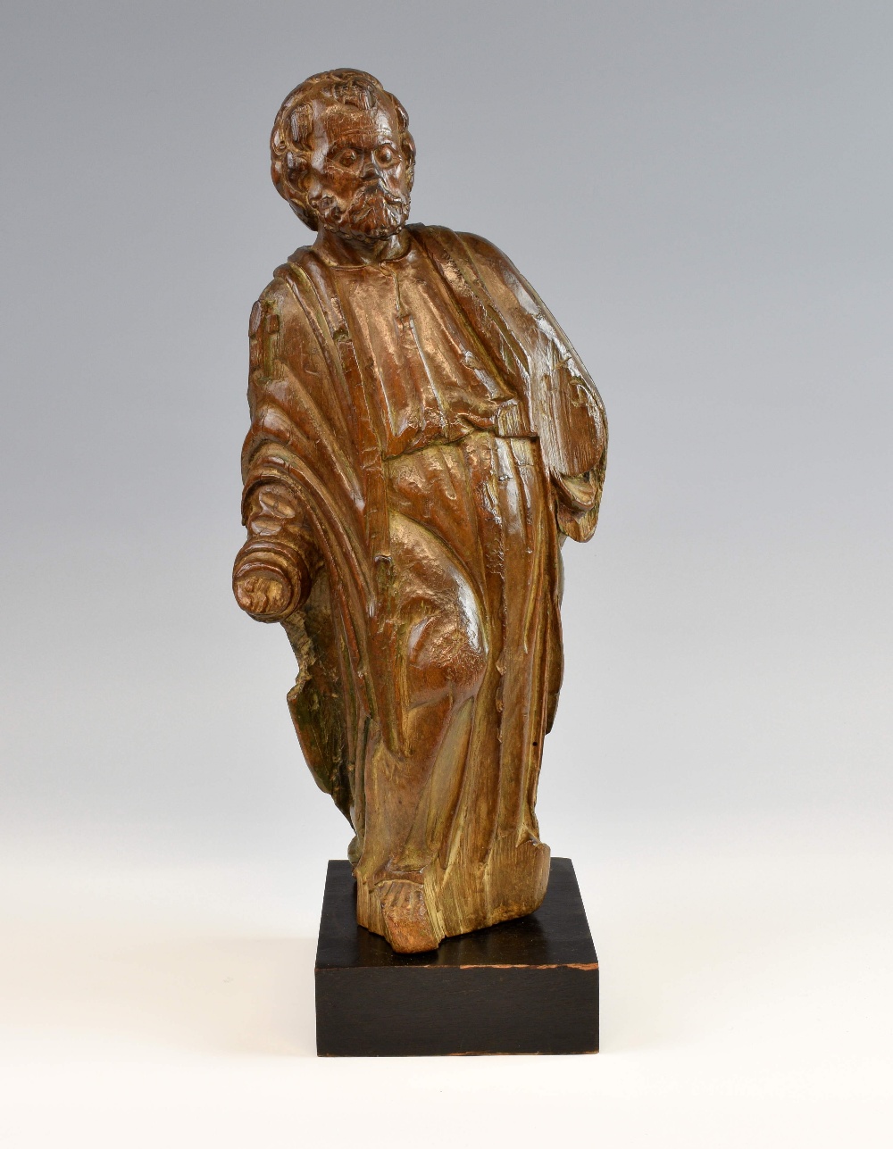 18th century carved wood figure of an Apostle 41cm high on later stand.