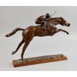 William Newton bronze of a race horse and jockey about to jump a fence 2/9 35cm long 31cm high .