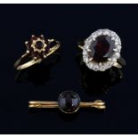 A garnet and cubic zirconia cluster ring 9ct gold, garnet cluster ring, and a garnet and 9ct gold