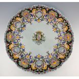 Large faience armorial charger, 51.5 cm.