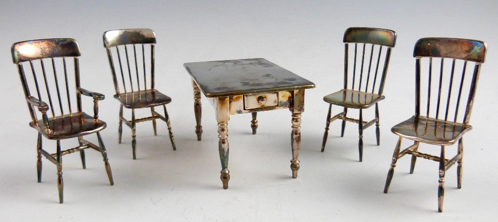 Mappin & Webb miniature silver plated kitchen table with single drawer and four chairs, table 6cm - Image 2 of 4