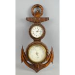 Early 20th century carved oak wall clock and barometer in the form on an anchor 50cm .