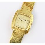 IWC Schaffhausen ladies dress watch 18k yellow gold rectangular case. Gold dial with gold hands