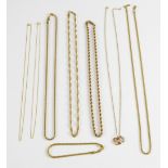 A group of gold jewellery, including rope, curb and fancy link chains and a pendant necklace with