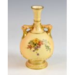 Royal Worcester blush ivory two handled vase, painted with flowers with spreading foot, 21 cm high.