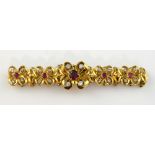 Vintage 1960's ruby and diamond bracelet, central larger link with oval cut ruby, estimated weight