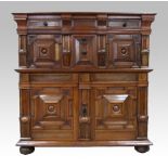 19th century continental mahogany and rosewood chest of two long drawers over cupboard enclosing