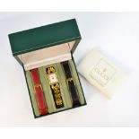 GUCCI - a gold plated quartz lady's bracelet watch, the plain white dial, rectangular case