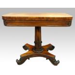 Regency walnut foldover card table with beize lined top, on octagonal column, quatrefoil base and