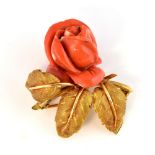 1950's Italian coral rose brooch, with leaf and stem detailing, measuring approximately 4.5cm x 4cm,