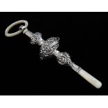 George V silver rattle with mother-of-pearl teething ring and handle, by Saunders & Shepherd,