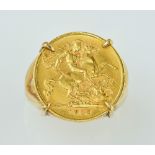 George V 1912 half sovereign ring, claw set in 9ct yellow gold, ring size T. Gross weight 9.3 grams