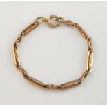 Victorian gold bracelet, of bar and fancy links, each bar stamped, 9 ct . Good condition 10.7 grams