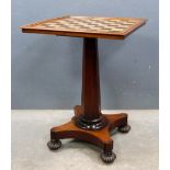 19th century rosewood games table with chess board top, on octagonal column support, quatrefoil base