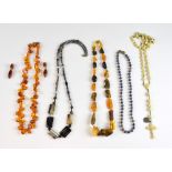 Vintage necklaces, a necklace of amber rough in shades of yellow to brown, a heated amber