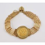 Gold gate bracelet set with Elizabeth II half sovereign dated 1982, set into 9 ct gold gate