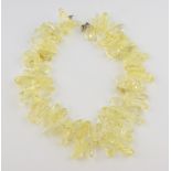 Polished citrine bead necklace, ninety two mixed shape citirine beads, with silver clasp strung on