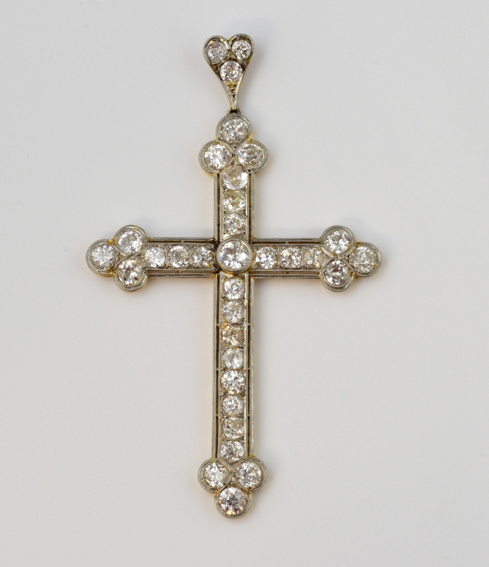 Late Victorian diamond set Gothic cross, with trefoil terminals and diamond set bale, old cut stones