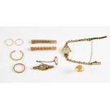 A group of gold jewellery, two gold tie clips, 14 ct, gold signet ring and another ring. 18 ct ,