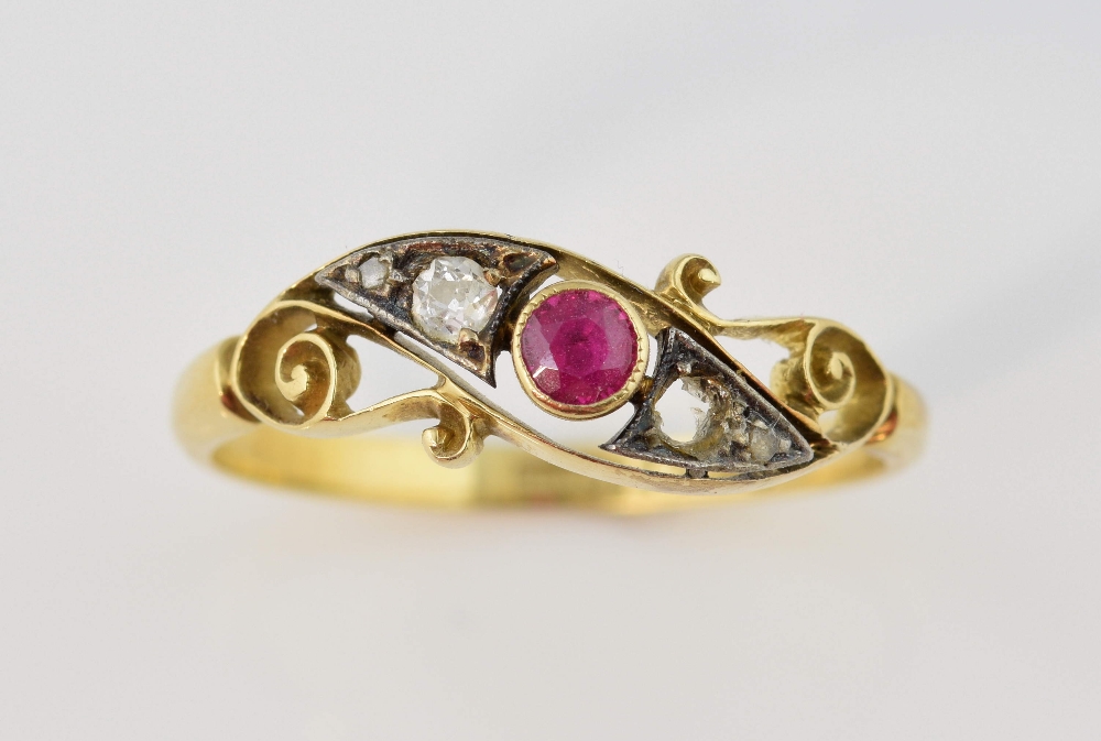 Edwardian ruby and diamond ring, central round cut ruby, old cut diamond and two rose cut