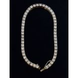 Diamond line bracelet set with fifty one brilliant cut stones, set in 18ct white gold, total diamond