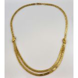 Gold double row chevron link necklace, with leaf detailing, box clasp with figure of eight safety