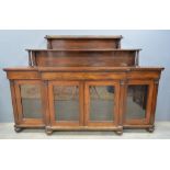 19th century rosewood breakfront sideboard with graduated tiered back, brass gallery, over three