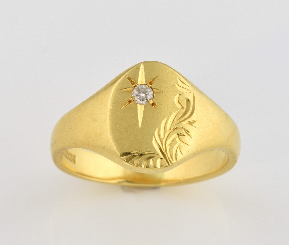 Oval signet ring, with engraved detail, and round brilliant cut diamond, set in 18ct yellow gold,