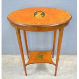 Early 20th Century satinwood and painted oval two tier table, 73 x 57 cm .