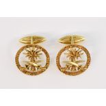 Gold cufflinks, Saudi Arabian coat of arms mounted in round boarder, with articulated fittings, in