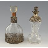 Dutch silver mounted etched glass decanter, the silver mount with pierced scrolling decoration and a