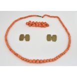 Victorian coral bead necklace to a barrel clasp, 44 cm, a matching brooch and a pair of 9ct gold