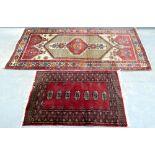 Red Ground Afghan type red ground rug 112cm x 78cm and a Persian type cream ground rug with