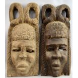 Two wooden Dogon masks, Mali, 20th century, 66 cm long PROVENANCE: Acquired by the owner's family in