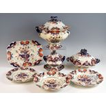 Extensive Masons Ironstone dinner service decorated with an Imari palette comprising 51 dinner