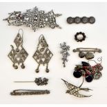 A group of antique jewellery, including white metal drop earrings, 19th century cut steel buckle,