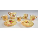 Selection of Royal Worcester blush ivory miniature porcelain comprising tea cup and saucer,