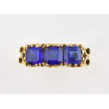 Vintage gold ring set with three synthetic sapphire stones, 18 ct gold, ring size J, and a platinum