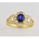 Sapphire and diamond dress ring, oval cut sapphire, estimated weight 0.96ct, surrounded by round