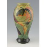 Moorcroft large ovoid vase decorated with Carp, against a green ground, Artists signature and date